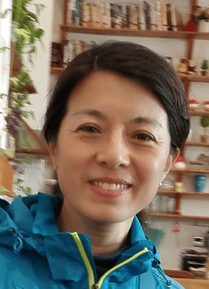 Sun Lifang, who wrote Niu Lai and composed its end-credits song, photographed at home